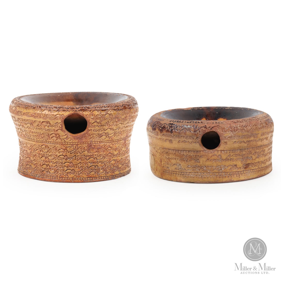 PEI Pottery Spittoon Pair: Canadian. 1880-1895. A pair of Prince Edward Island Pottery spittoons. Both with attractive, profuse coggling, typical of this pottery.SizeMarked: 3.25" x 6.5" (base diameter). Unmarked: 4.5" x 8"