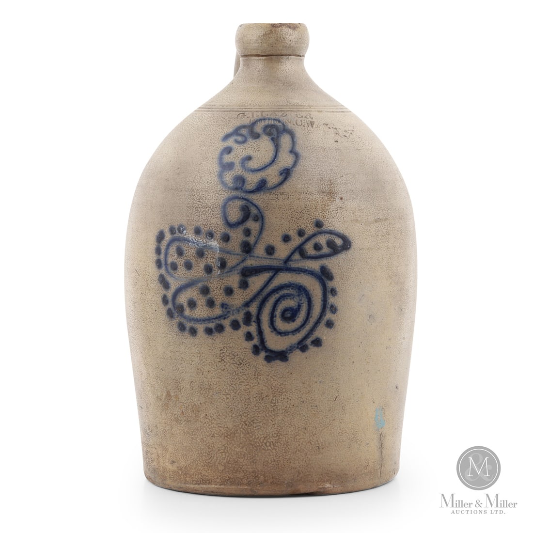 Lazier, Picton CW 3 Gal Jug: Canadian. 1864-1879. George Irwin Lazier 3 gal jug from Picton, Canada West. The style of decoration is quite unusual for Lazier and looks like a variant of the bowtie more commonly seen on earlier Sk