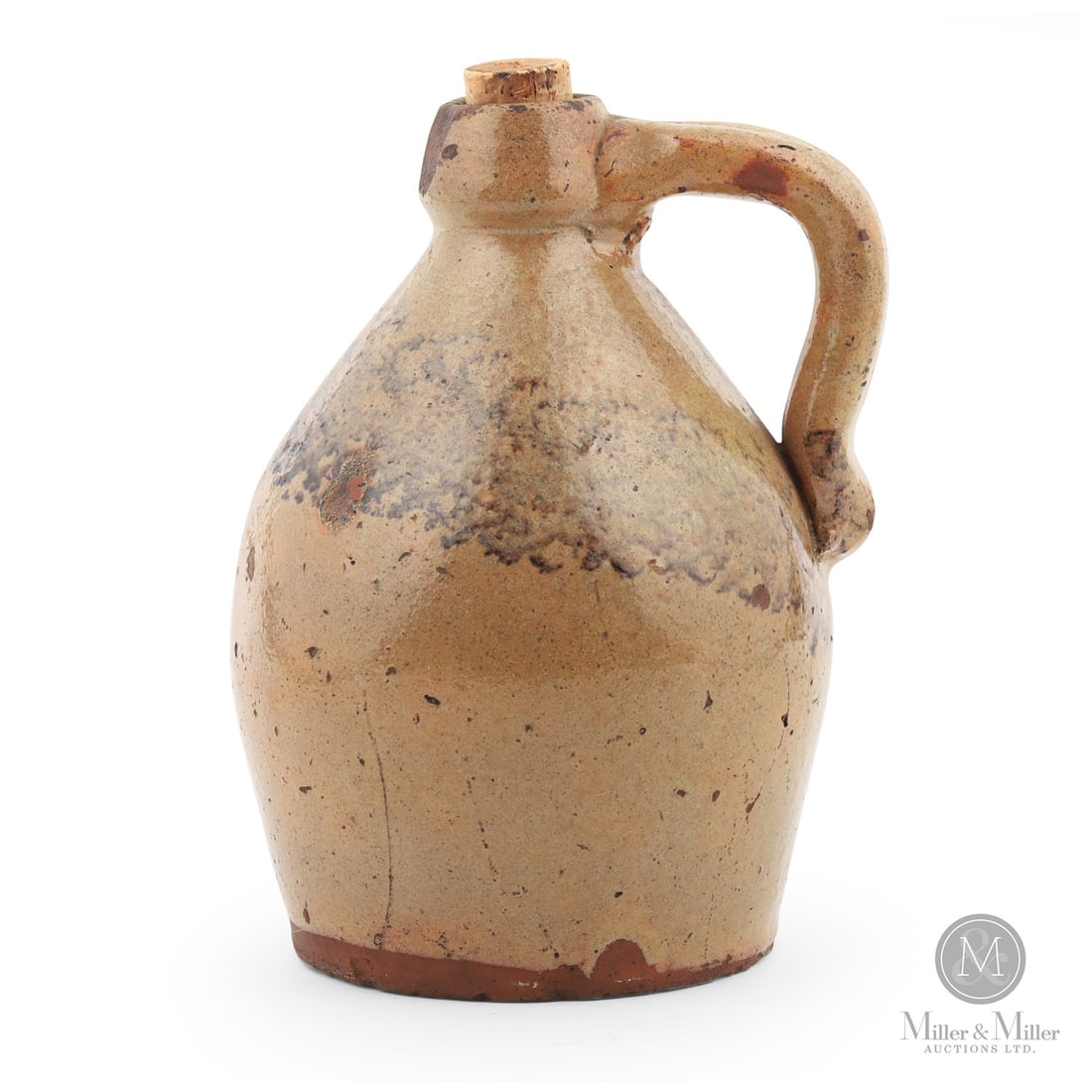 Egmondville Earthenware 1/4 Gal Jug: Canadian. 1860-1880. A 1/4 gal earthenware jug with sponge decoration. Certainly southwest Ontario and most likely Egmondville, Ontario. Great glaze. Rare to see Ontario pieces decorated in this fashi