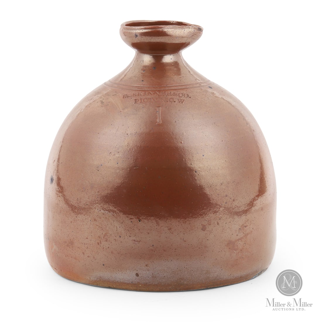 Skinner & Co., Picton CW 1 Gal Molasses Jug: Canadian. 1855-1864. Samuel Skinner & Company 1 gal molasses jug from Picton, Canada West. Attractive squat form with exaggerated pour spout.Size8.5" x 8" (base diameter).ConditionVery good