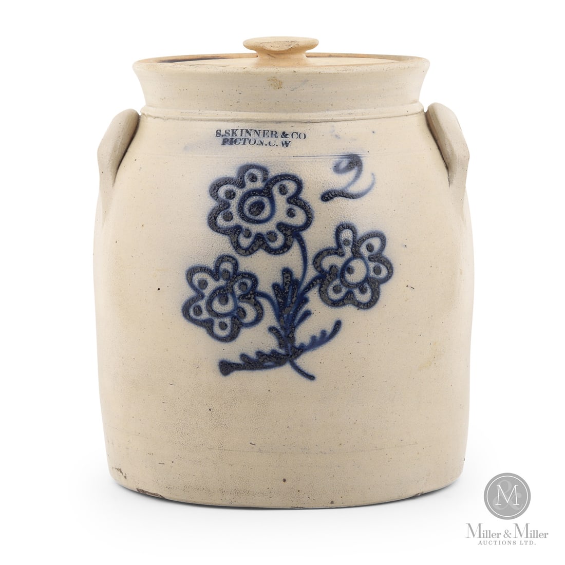 Skinner & Co., Picton CW 2 Gal Cream Crock: Canadian. 1855-1864. Samuel Skinner & Company 2 gal cream crock from Picton, Canada West. Attractive three-flower design.Size11" x 9.5" Dia.ConditionNear mint. Original lid has small flake off