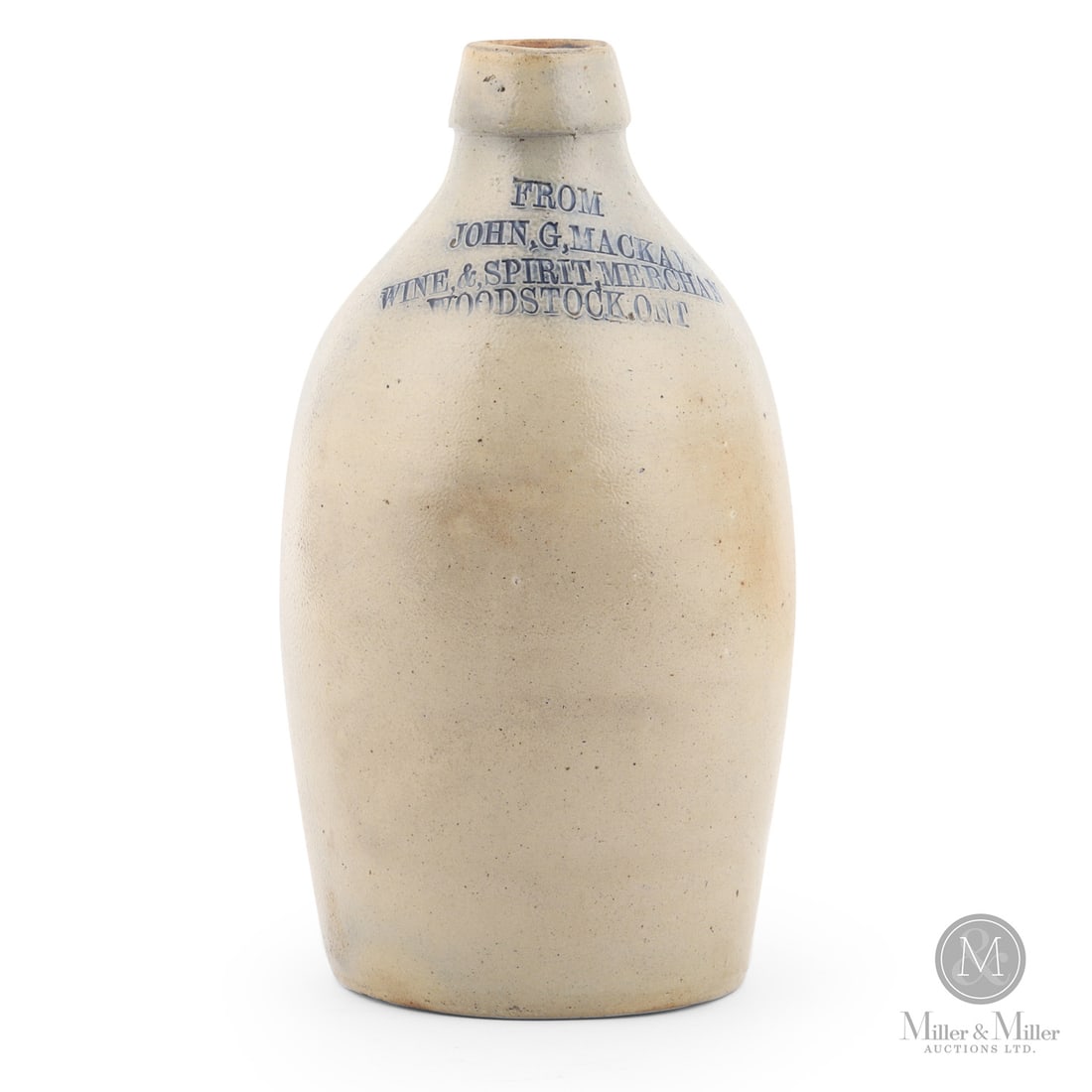 Mackay, Woodstock 1/4 Gal Jug: Canadian. 1880-1890. John G. MacKay 1/4 gal jug from Woodstock, Ontario. Attractive small size with four lines of writing. Size 9" x 4.25" (base diameter). Condition Near Mint. Medium Stoneware.</