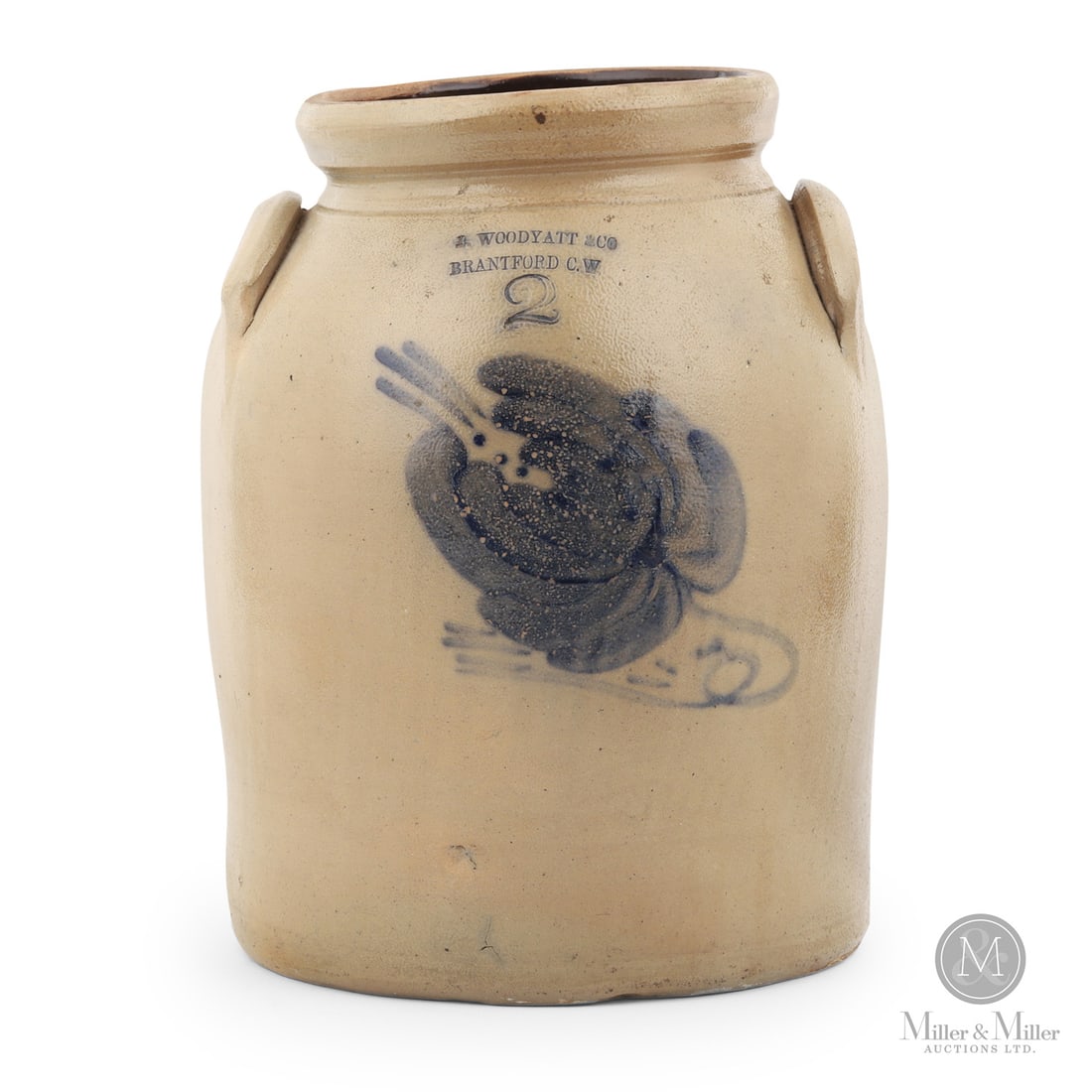 Woodyatt & Co., Brantford CW 2 Gal Jug: Canadian. 1857-1859. James Woodyatt & Company 2 gal cream crock from Brantford, Canada West. Scarce mark. Large single flower decoration.Size11.5" x 8.5" (base diameter).ConditionVery good condition.
