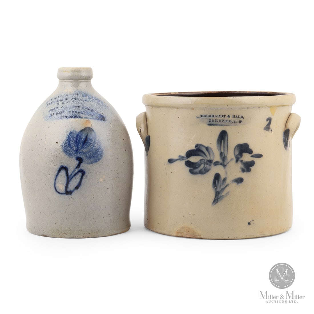 Pair of Toronto Crocks: Canadian. 1863-1879. A pair of Toronto crocks. Left is a William Strachan 1 gal jug from Toronto, Ontario. Single flower by Eberhardt, Toronto. Right is an Eberhardt & Halm 2 gal cream crock from