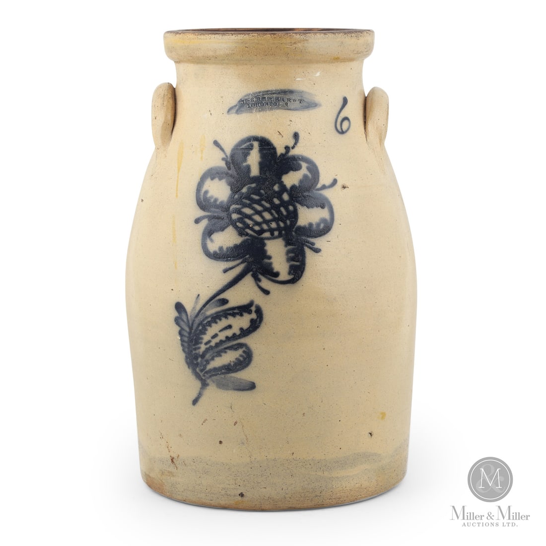 Eberhardt, Toronto 6 Gal Churn: Canadian. 1867-1869. Nicholas Eberhardt 6 gal butter churn from Toronto, Ontario. Fabulous huge sunflower. Has the "O" for Ontario, so it can be dated post-Confederation, but only just.Size19" x 12"