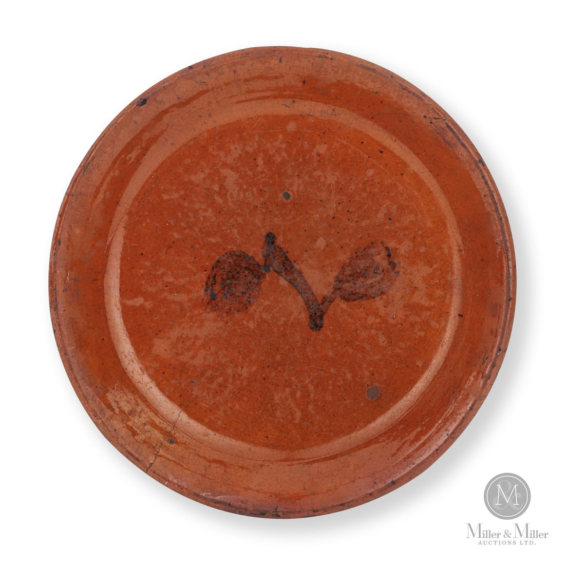 Eby, Conestogo Earthenware Plate: Canadian. 1857-1900. William Eby pie plate from Conestogo, Ontario. Classic Eby cherry decoration.Size1.25" x 8.5" x 8.5".ConditionVery good condition. 2" and 5" hairline in the rim. Blackened from