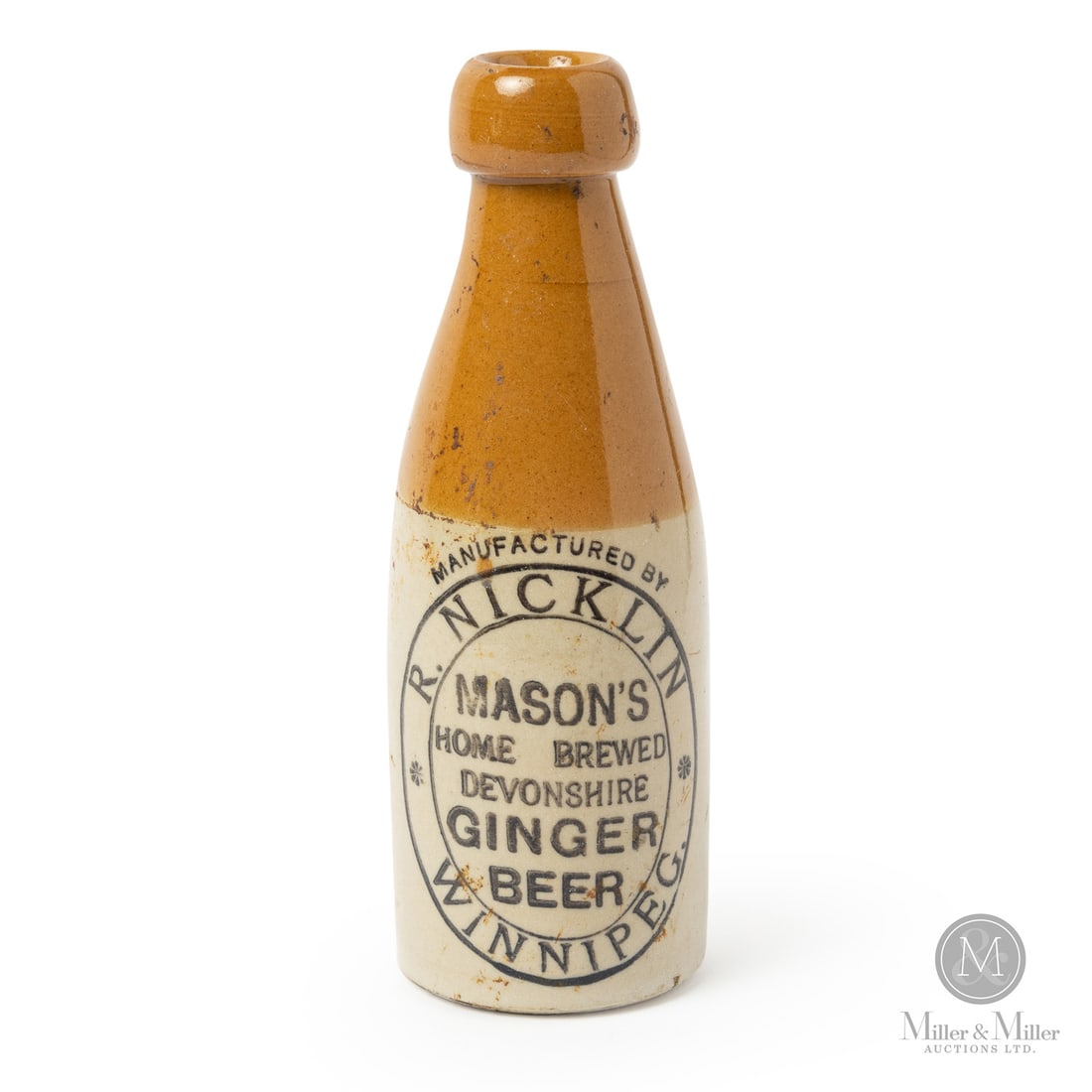 Nicklin, Winnipeg Ginger Beer: Canadian. 1890-1910. R. Nicklin Mason's home-brewed Devonshire ginger beer from Winnipeg, Manitoba. Extremely rare bottle.Size7.75" x 2.75" Dia.ConditionExcellent condition. Some rust and stain that