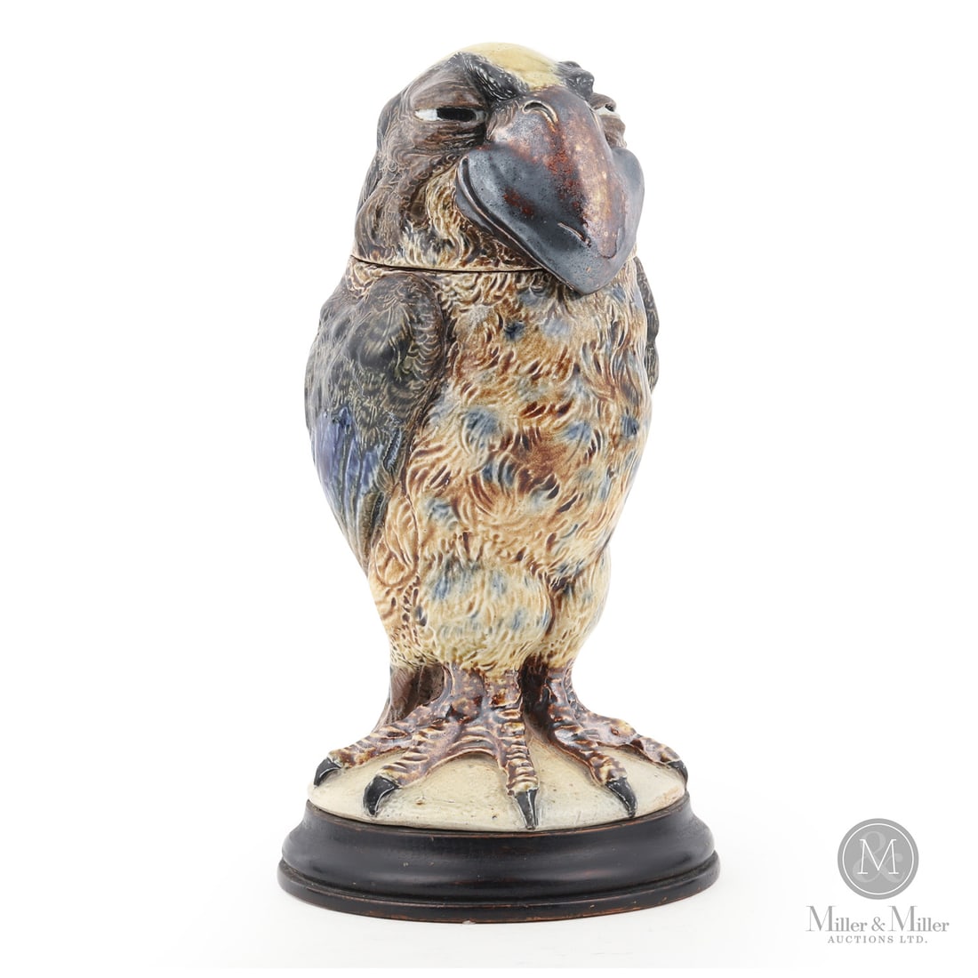 Exceptional Martin Brothers "Wally Bird" Jar: British. 1897. The Martin Brothers Potters are best known for their grotesque anthropomorphic pieces, the most popular being lidded jars in the shape of birds. These are referred to as Wally birds, af