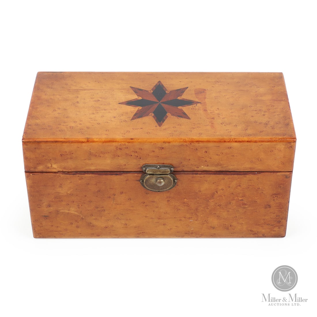 Birdseye Maple Deed Box with Compass Star: Canadian. Wood. A birdseye maple deed box with an inlaid three-colour compass star on the top. The box is finely constructed with mitred corners, brass hardware and has an excellent crazed surface. No