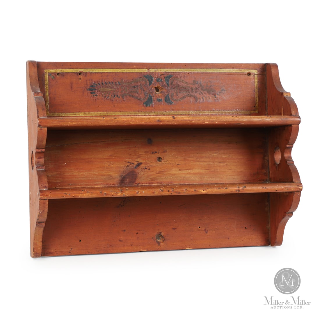 York County Shelf: Canadian. Wood. A two-tier York County wall shelf with scalloped sides and decorated with multi-coloured stencils and striping. Very good condition with a few minor chips on the left top side. Illustr