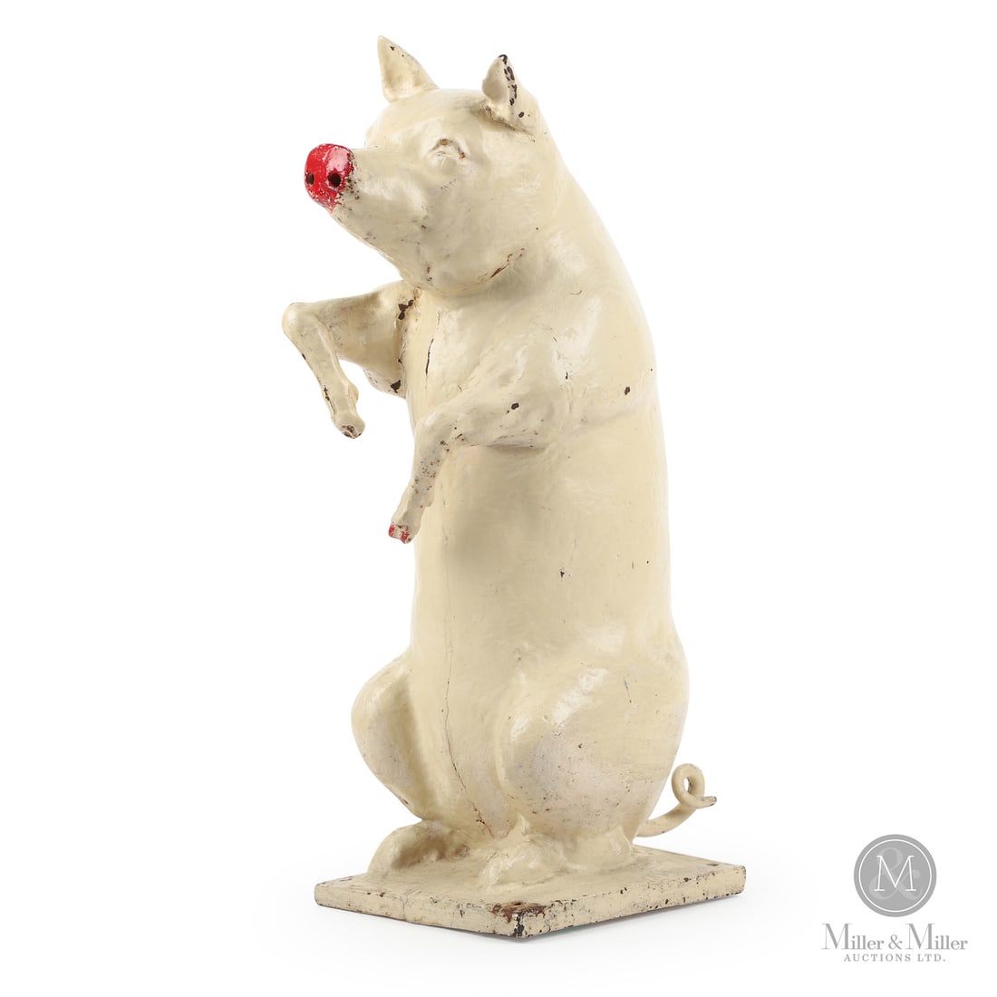 Cast Iron Pig Counter-Top Display: Canadian. Metal. A cast iron sitting pig in original cream-white and red paint. Used as a butcher shop counter display, in very good condition with an articulated curled tail. Ex Marjorie Larmon