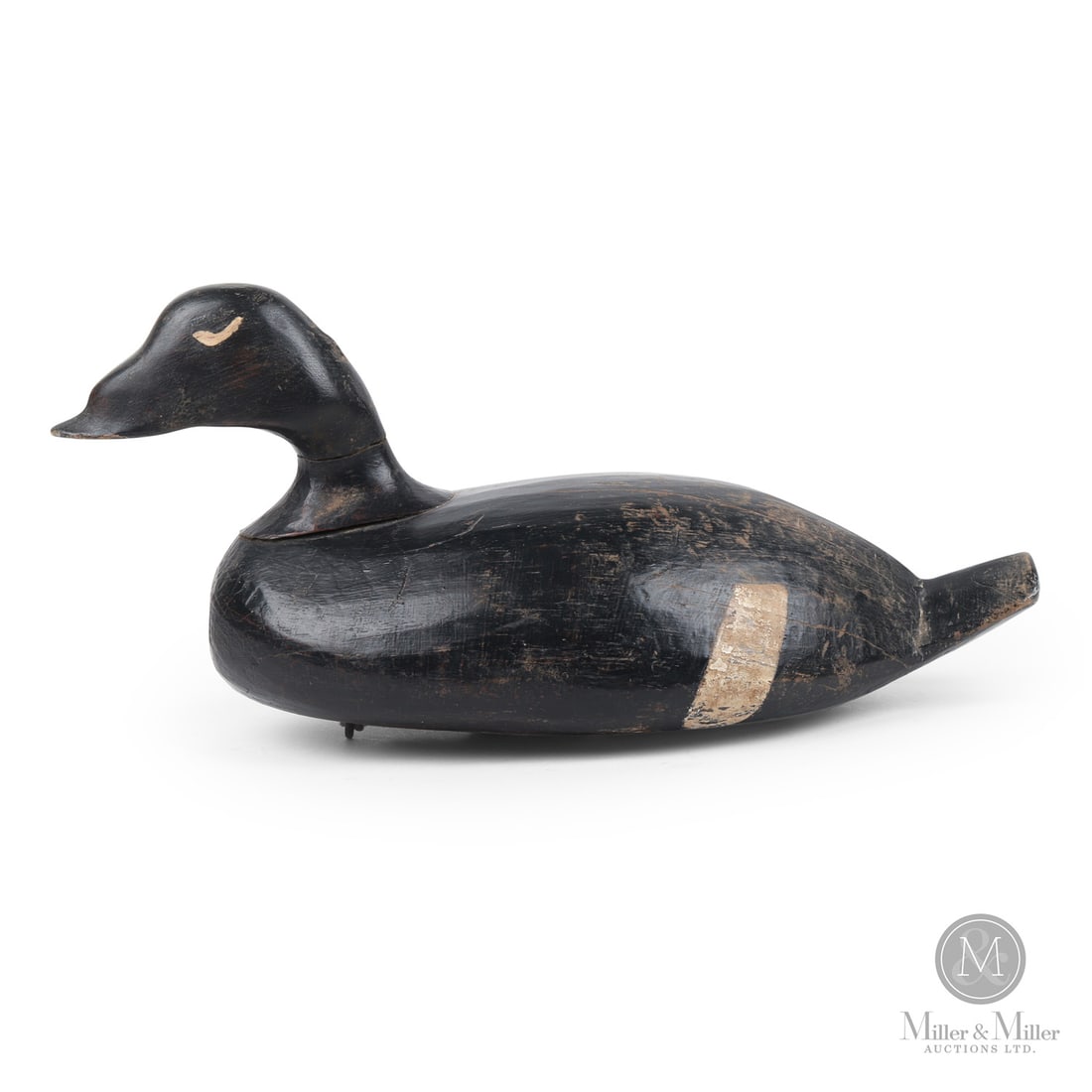 East Coast Tancook Island White Wing Scoter Decoy: Tancook Island, Nova Scotia. Second Quarter 20th Century. Painted wood. 8.25" x 17.25" x 7". From a long time, Private Nova Scotia Collection. Tancook Island, Nova Scotia. Second Quarter 20th Century.