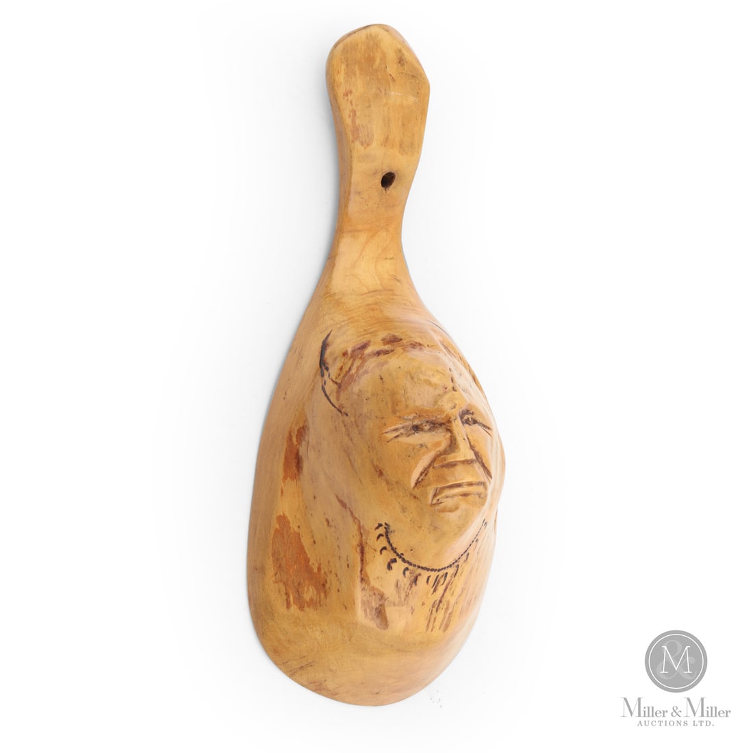 Indian Head Canoe Cup: A canoe cup having a carved Indigenous face and a painted bear claw necklace. Excellent condition, nice natural patina. Second quarter 20th century. 2.25" x 6.75" x 2.75". From the Art and late