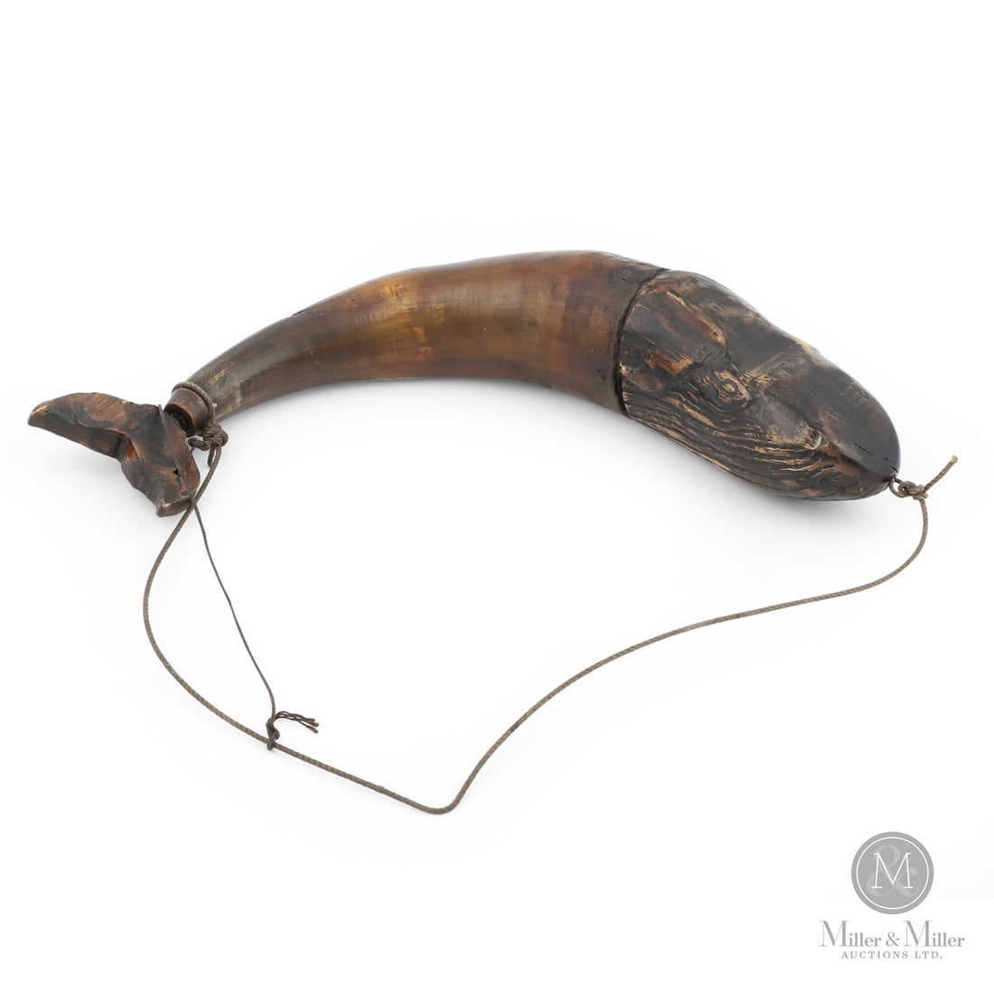 Newfoundland Whale Tail Powder Horn: Canadian. Horn, wood. A Newfoundland powder horn inscribed, "C. Pond__ Aug 21 1889 Fosters Point", with the plug carved as a whale head and a later carved stopper in the shape of a whale tail.