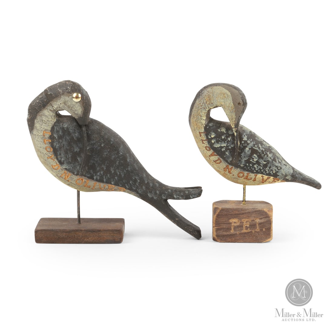 Lloyd N. Oliver (1923-2013), Prince Edward Island, Shorebird Decoys: Prince Edward Island. Third Quarter 20th Century. Painted wood. Marked, "Lloyd N. Oliver". Marked, "P.E.I.", on base of one decoy. 7.5" x 9" x 2.75" and 7.5" x 6.5" x 2". From the late Cathy