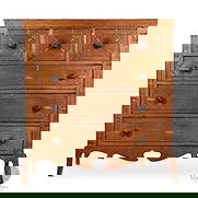 Folky Quebec Chest of Drawers: Canadian. Wood. An exuberant and folky Quebec chest of drawers with a deeply scalloped high base and flared "French" feet. Constructed in butternut and pine, the chest has the unusual feature of a