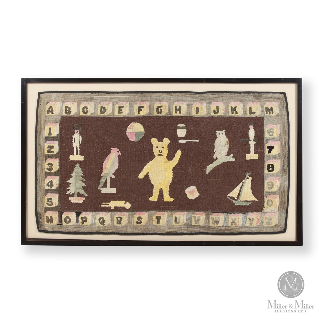 Child's Nursery Alphabet Hooked Rug: Canadian. Wool. A wonderful hooked rug for a child's nursery with strong images and good colour. The grey border consists of small pink and white blocks with alphabet letters and numbers surrounding