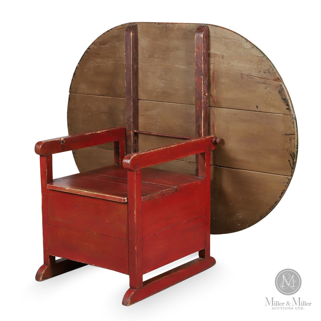 Quebec Chair Table: Canadian. Wood. A pine shoefoot chair table in original paint, red over blue-green, and with a large three-board oval top. Great condition, pegged construction, simple form with a storage compartment