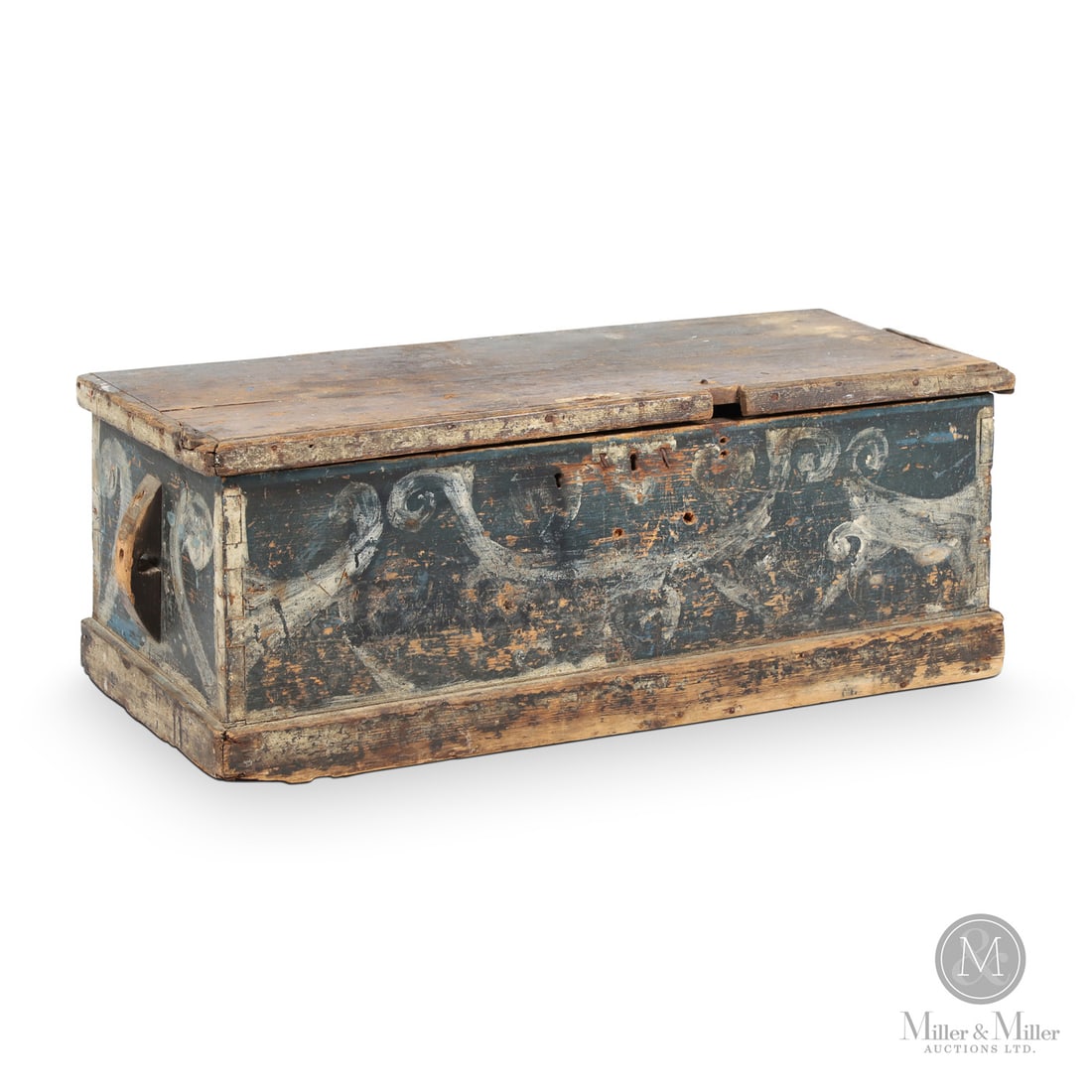 Painted Sailor's Chest: Canadian. Wood. An early dovetailed pine sea chest with a canted front, bracket base, and original paint. The surface on the front and top is very weathered, but the paint on the back and sides is str