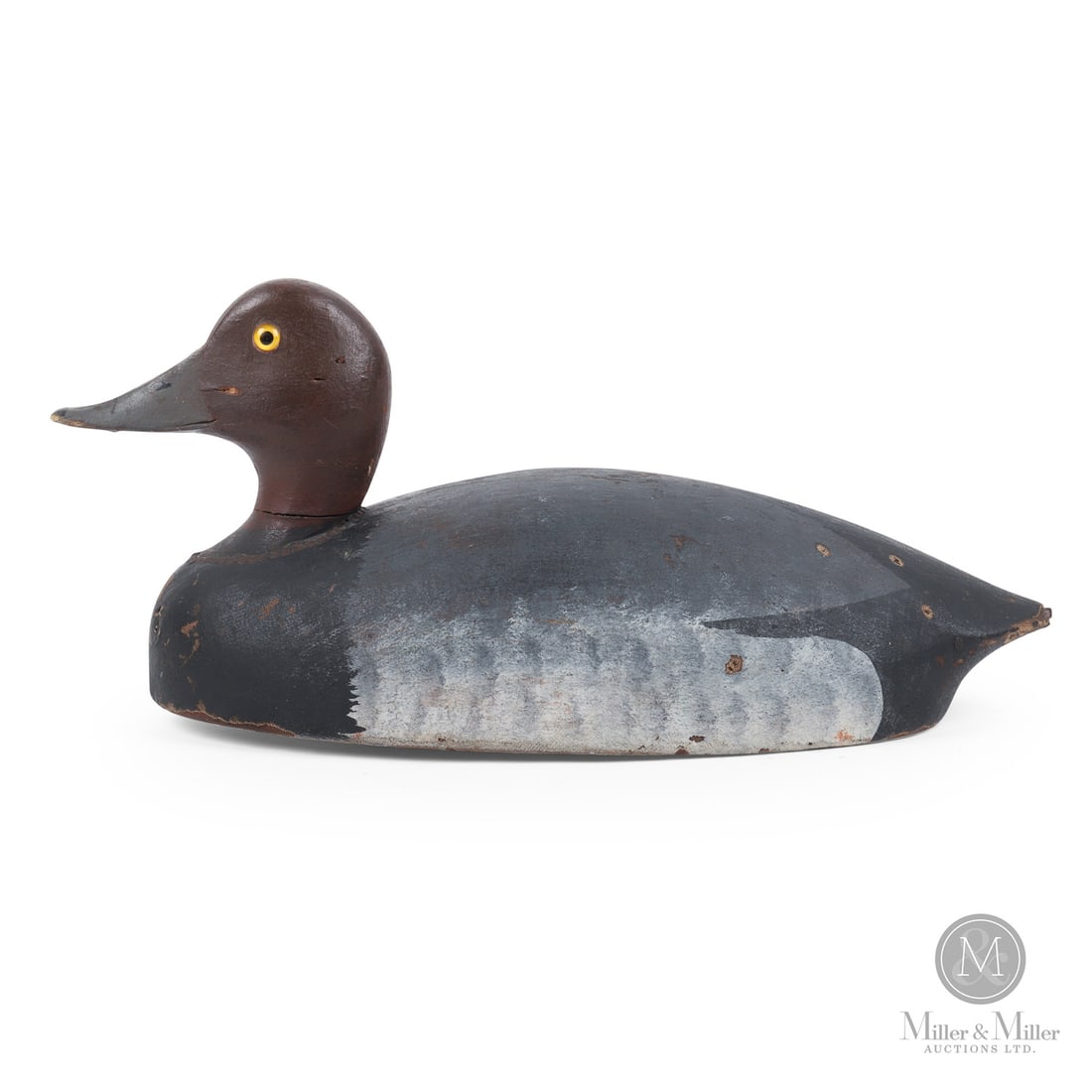 Charlie Reeves (1877-1941), Port Rowan, Ontario, Redhead Drake Decoy: Port Rowan, Ontario. 1916. Painted wood, canvas. Hot branded, "W P T". (William P Thompson - Long Point Company Member from 1916-1922), bottom. 6.5" x 14.5" x 6.5". From the Art and late Shirley