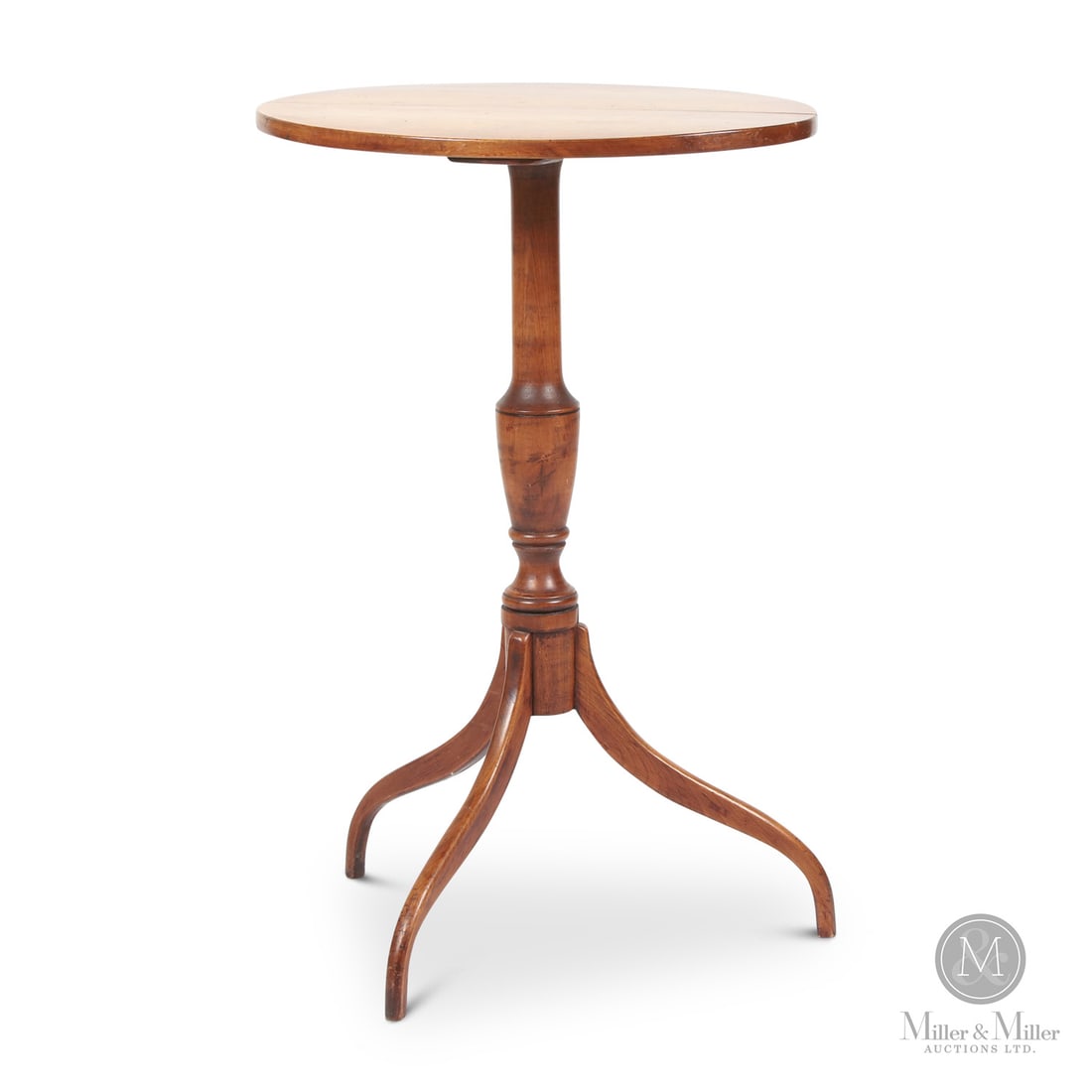 Spider Leg Candle Stand: Canadian. Wood. An oval top, cherry candle stand with high spider legs, dovetailed into the finely turned shaft. Excellent refinished condition with warm, uniform patina. 1790-1820. 29.5" x 19" x