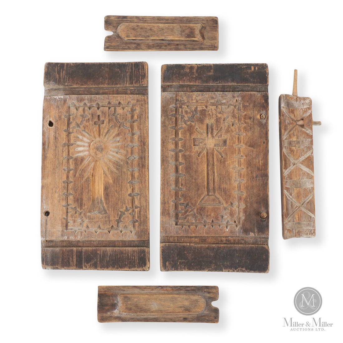 Book Maple Sugar Mold: Canadian. Wood. A 19th century maple sugar mold in the form of a prayer book with a carved monstrance on one side and a cross on the other. All original sections intact, missing two pegs. Very good,