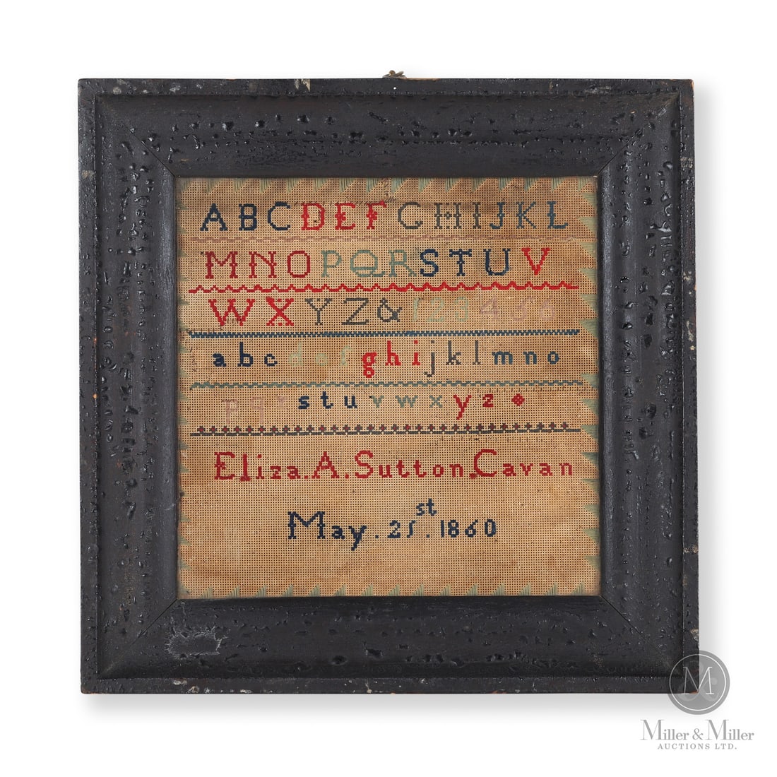 1860 Cavan Sampler: Canadian. Wood. An Ontario needlework sampler stitched by "Eliza. A. Sutton. Cavan, May 21st 1860" showing a simple alphabet in multi colours with a simple green sawtooth border. Mounted in the
