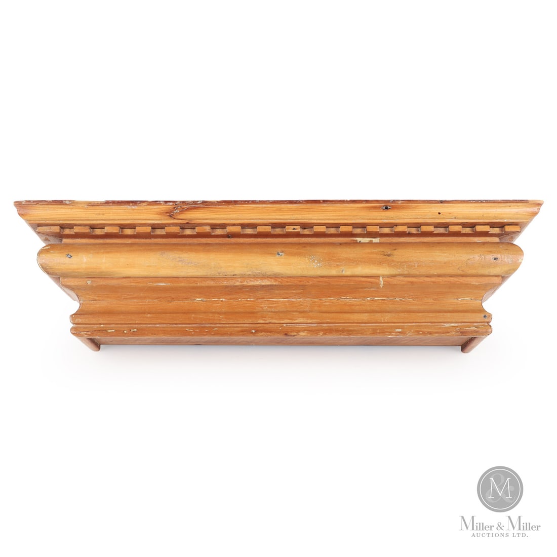 Pine Wall Shelf with Dentil Molding: Canadian. Wood. A robust pine clock shelf with a dentil molding. Very good condition, refinished. Quebec, C. 1875. 6.5" x 26" x 7". From a long time, Private Nova Scotia Collection. Canadian. A
