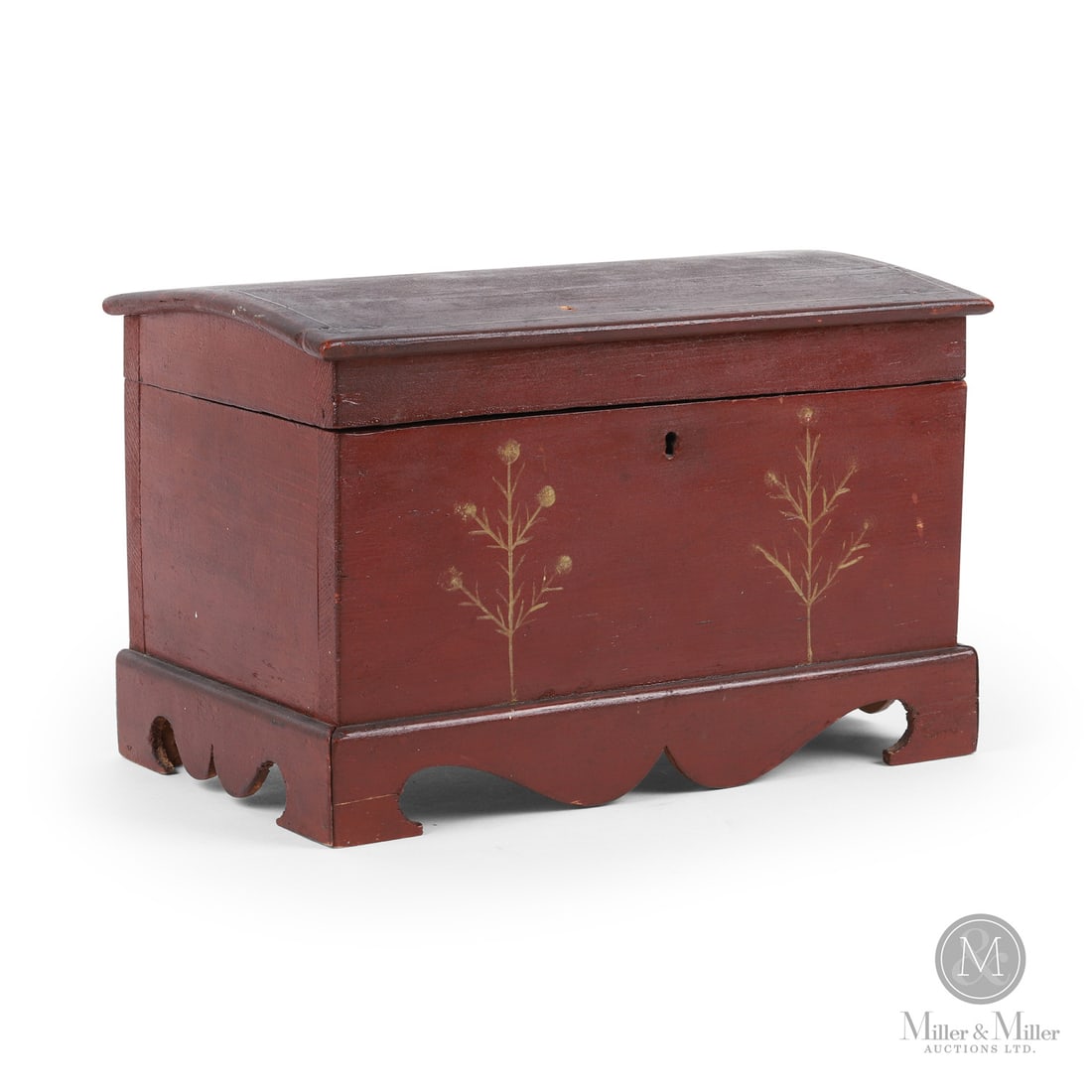 Deed Box with Tree Motifs: Canadian. Wood. A dome top deed box with a scalloped bracket base and having two trees-of-life painted in cream paint on the finely oxidized red/brown background. Exceptional form and design,