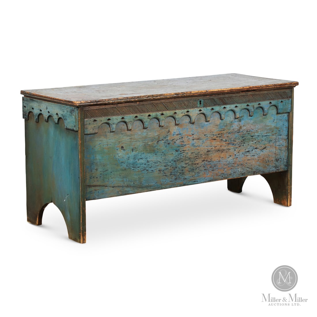 Blanket Chest with Scalloped Frieze: Canadian. Wood. An early low blanket chest in original blue paint with an unusual scalloped and pierced frieze that incorporates diagonal matchstick reeding on the front. Retains the original lock and