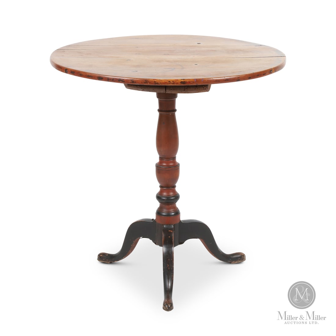 Ontario Chippendale Tea Table: Canadian. Wood. A Chippendale-style tea table in maple with a nicely turned pedestal. Top has been scrubbed, and the red and black paint on the base is restored. Minor glue repairs to the top, undersi