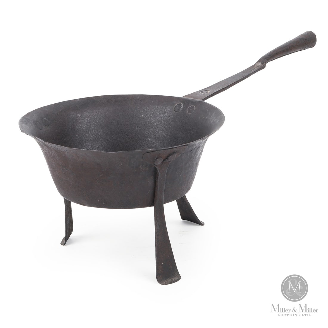Fireplace Pan with Heart: American. Iron. A nicely shaped fireplace saucepan or posnet on forged tripod legs with the iron handle having a socket for a wooden extension. The top of the handle bears a touchmark stamp in the
