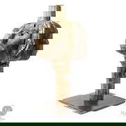 Burl Multi-Face Sculpture: Canadian. Wood. A three-face sculpture possibly representing a family unit of mother, father, and child, innovatively carved from a natural burl branch and mounted on a contemporary steel base. Each