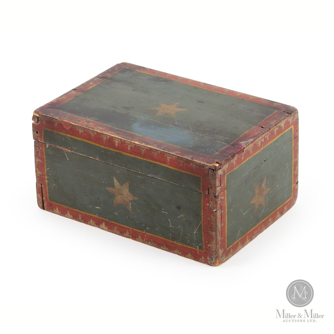 Folk Painted Dresser Box: Canadian. Wood. A folk painted dresser box with the top, front and sides having a gold star on an oxidized blue background within a painted red and yellow border. The box is dovetailed and retains the