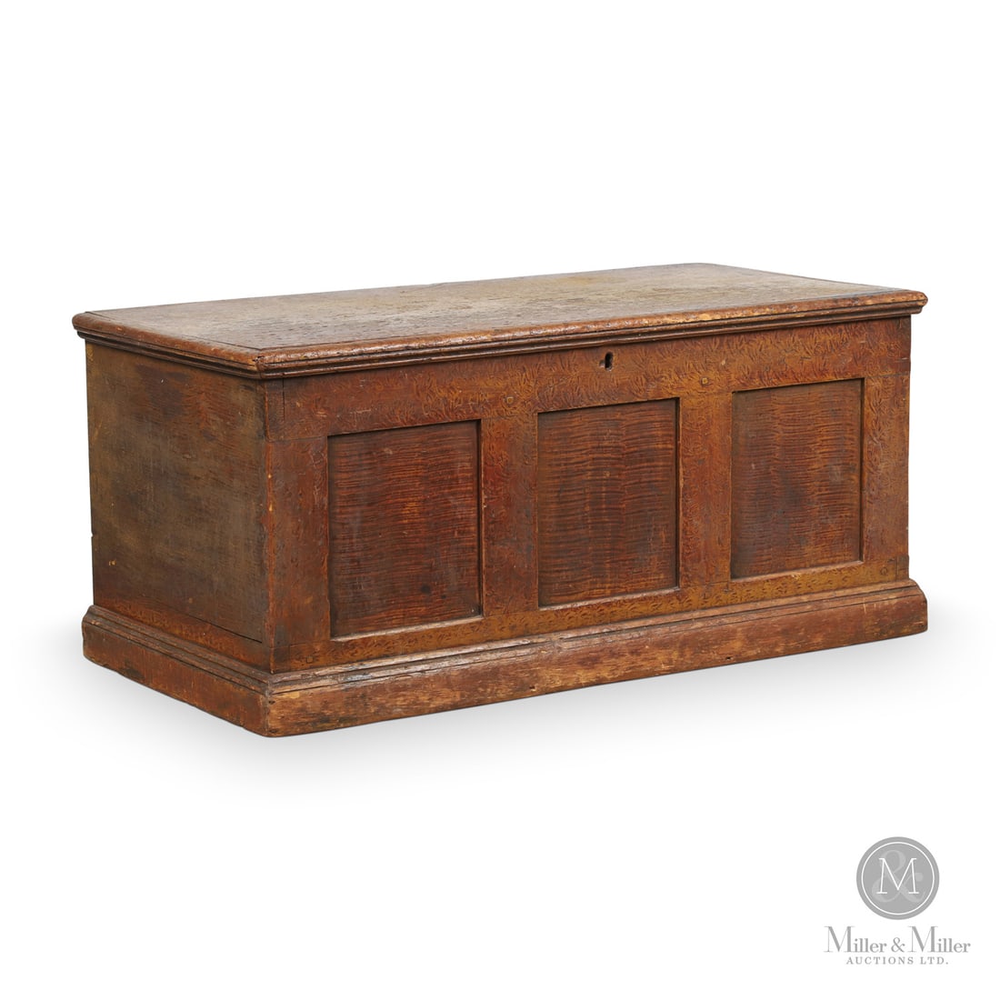 Huron County Panelled Blanket Box: Canadian. Wood. A Huron County dovetailed pine blanket chest with a panelled front and retaining the original sponge and comb-grained surface in yellow and red paint. The interior shows an open till w