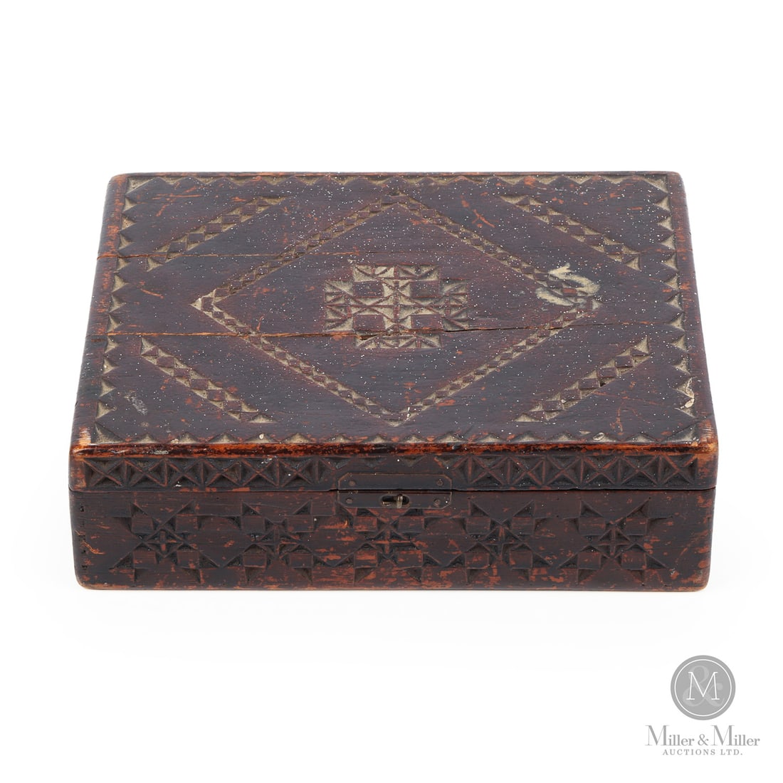 Chip Carved Cigar Box: Canadian. Wood. A meticulously chip-carved cigar box in a warm oxblood surface, made from a turn-of-the-century Benson & Hedges box (London, Montreal, New York). C. 1900. 2.5" x 8.5" x 6.75". From a l