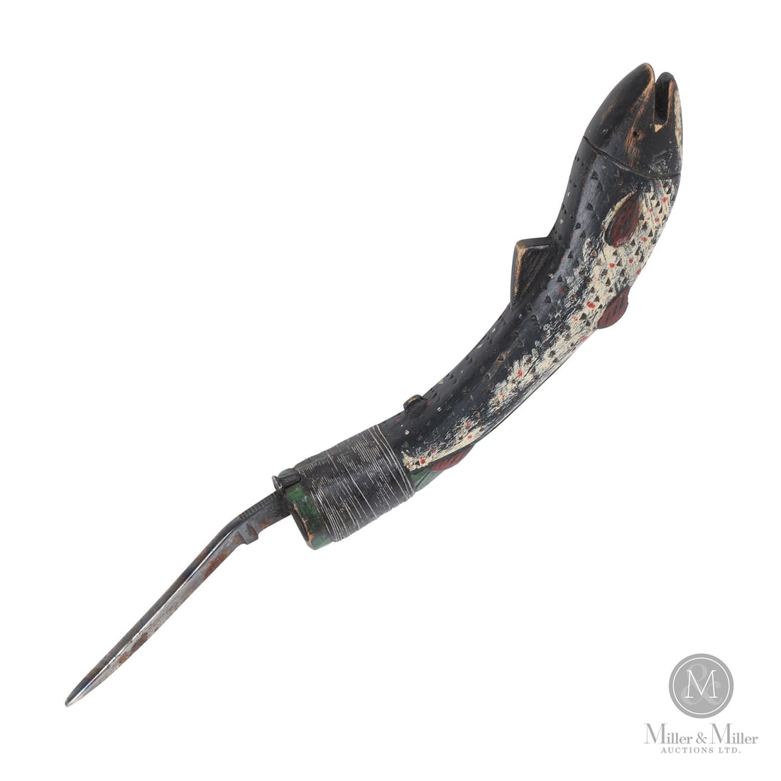 Polychrome Fish Crooked Knife: Canadian. Wood, metal. A contemporary crooked knife with the handle being a carved speckled trout in polychrome paint and incised with the initials, "JG", on the belly. Very good condition with an