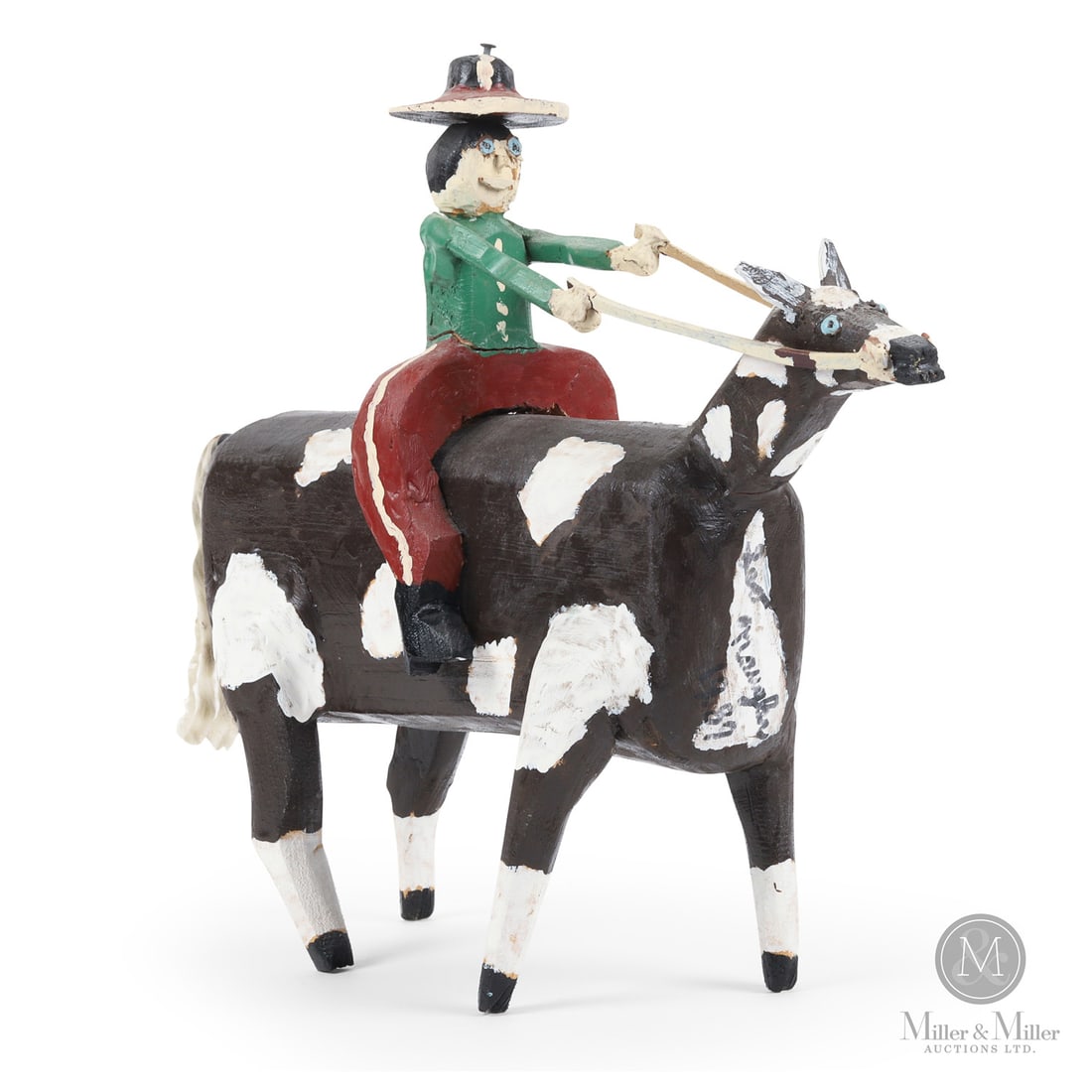 Leo Naugler Man on Horse Carving: The carving from Leo Naugler's (1956 - ) earlier career depicts a rider enthusiastically pullings the reins. The horse is about all he can handle.