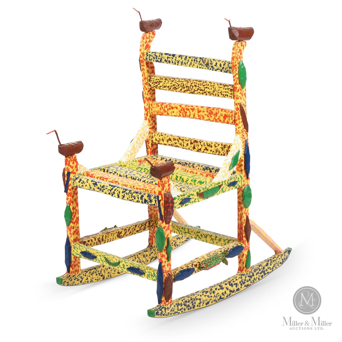 Leo Naugler Chair: Creatures are a major part of Leo Naugler's (1956 - ) repertoire and here he creatively places them on a carved and brightly coloured rocking chair. The finials are brown ducks, and a fish swims
