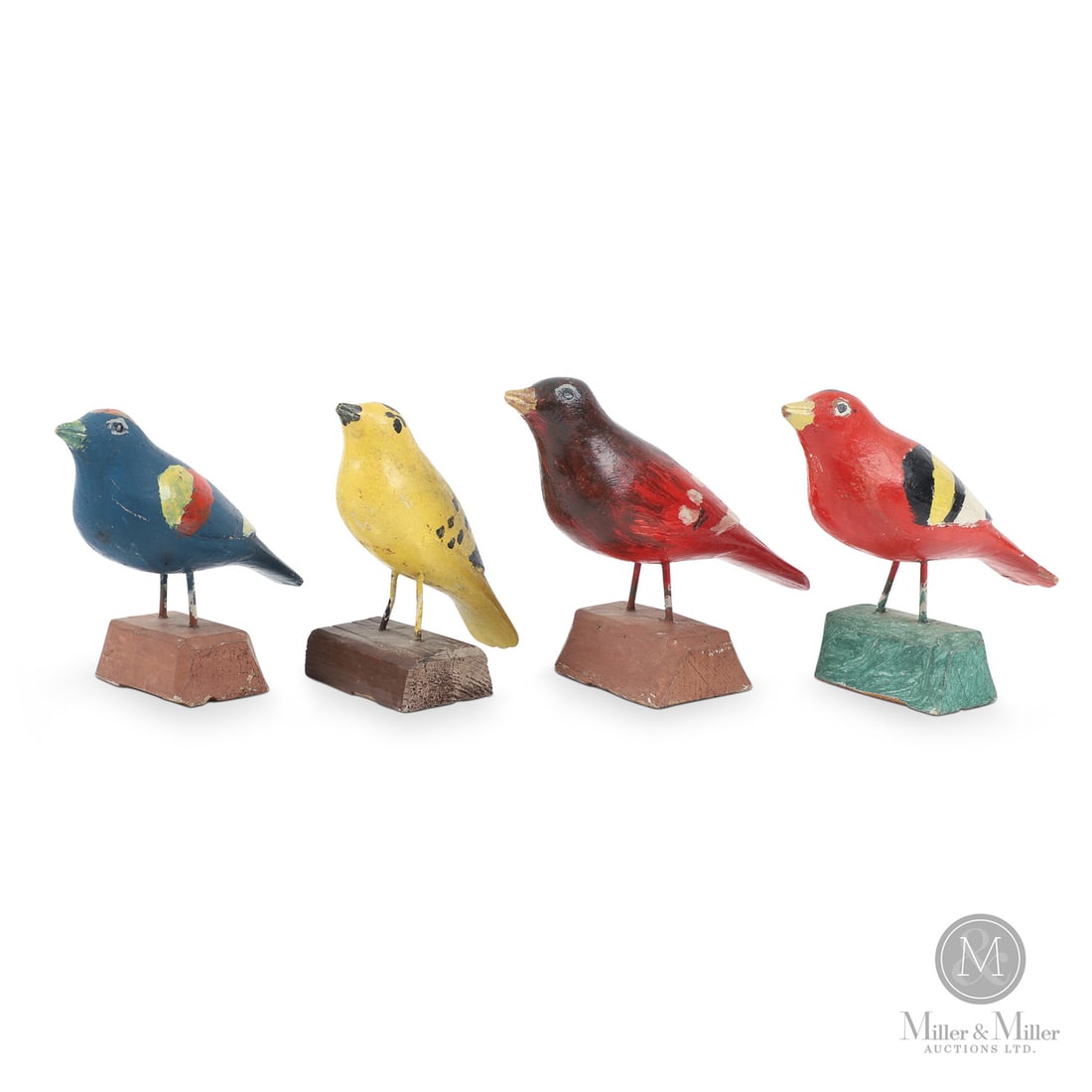 Wilfrid Richard Song Bird Carvings: Wilfrid Richard (1894-1996) had a knack for carving accurate and colourful birds. These four songbirds are well-carved and painted; late creations in his illustrious career.