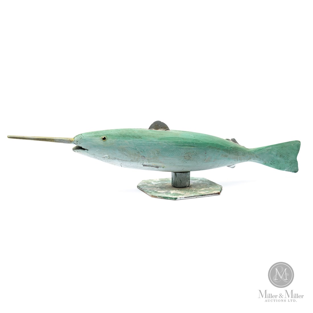 Sid Howard Swordfish: Here Sid Howard (1913-1992) is known for his naive wooden carvings of humans, birds, animals, and fish. Here he presents a swordfish painted in a turquoise colour and mounted on a painted base.