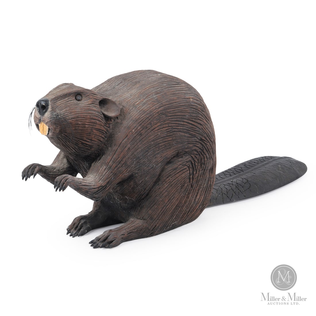 Gordon McCartney Beaver Carving: Gordon McCartney (1949-2012) was an accomplished wood carver who took pride and great care in the creations he made. This beaver is particularly well-carved and painted. His work shows a confident