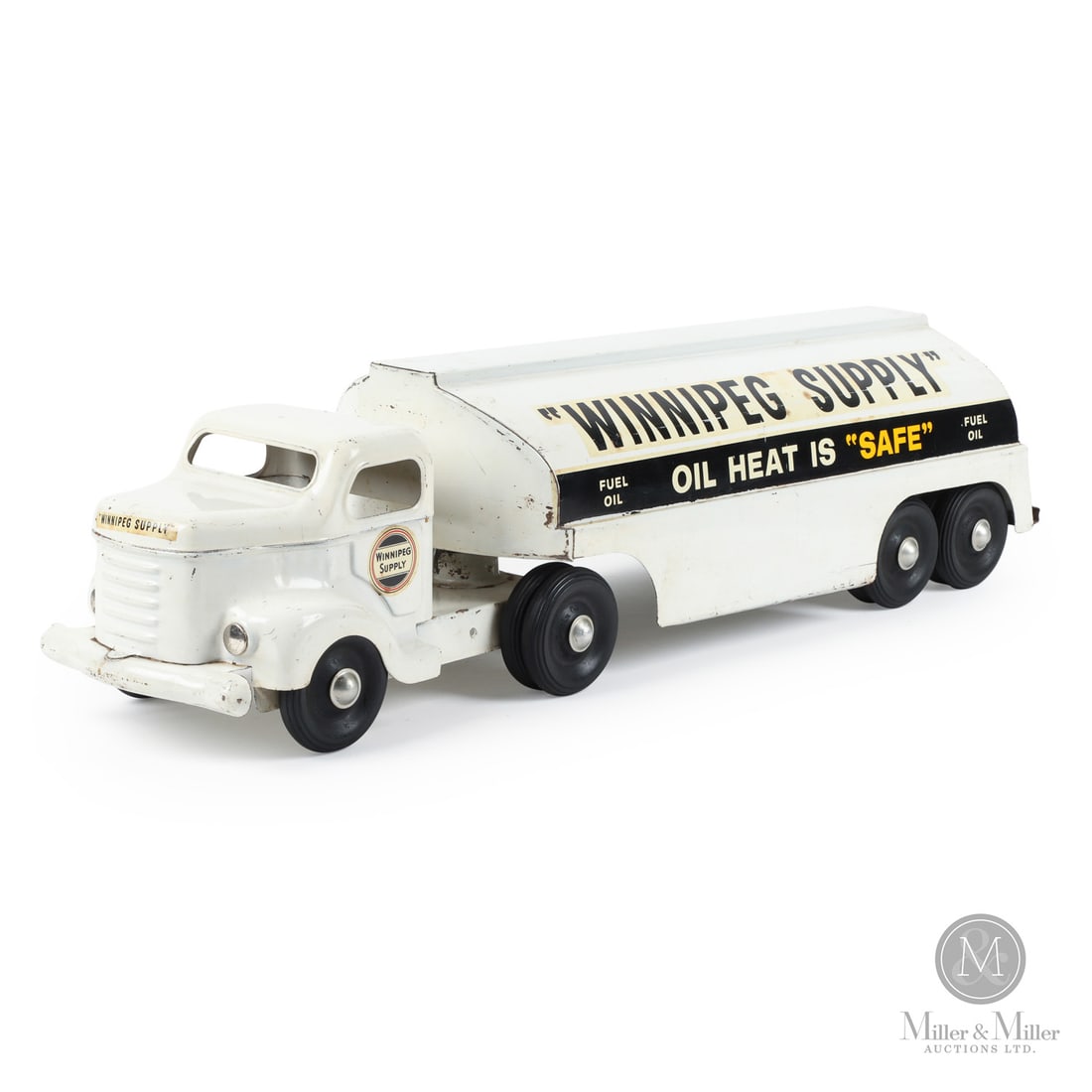 Otaco Minnitoys "Winnipeg Supply" Oil Tanker: Canadian. 1950s. Pressed steel. This oil tanker was part of Otaco's "private-label" series of toys. Private-label toys were promotional or display models made for specific companies and not intended f