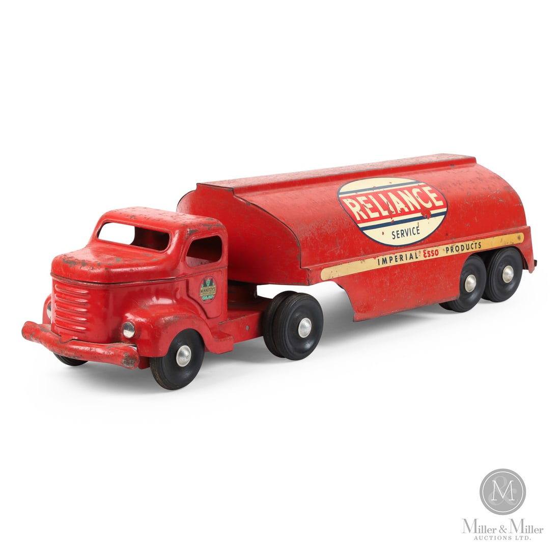 Otaco Minnitoys "Imperial Esso Reliance Service" Oil Tanker: Canadian. 1950s. Pressed steel. This oil tanker was part of Otaco's "private-label" series of toys. Private-label toys were promotional or display models made for specific companies and not intended f
