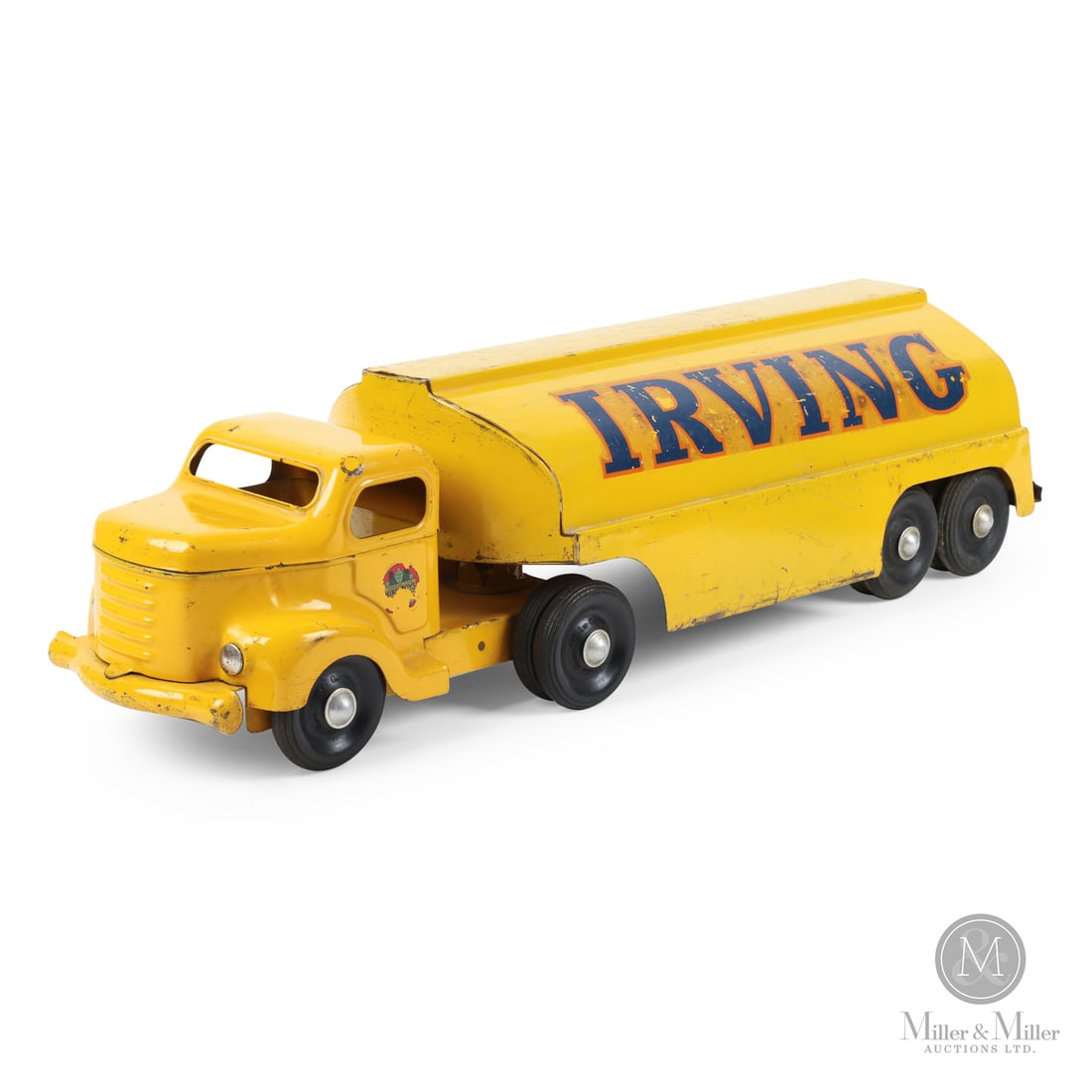 Otaco Minnitoys "Irving" Oil Tanker: Canadian. Late 1940s-early 1960s. Pressed steel. The "Irving" oil tanker was part of Otaco's "private-label" series of toys, made as advertising for what is today (2026) Canada's largest oil refinery.