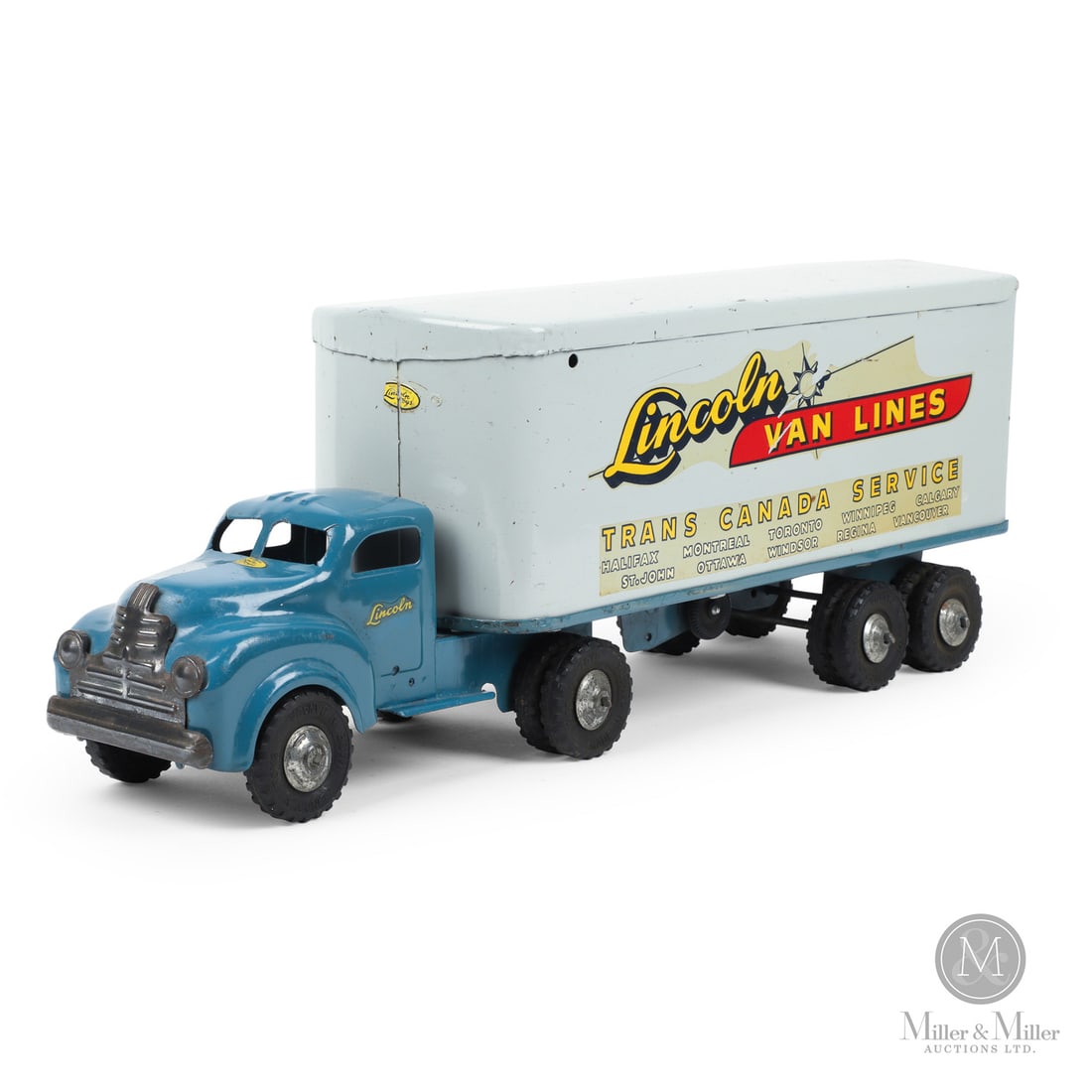 Lincoln Toys "Trans Canada Service" Tractor Trailer (Blue/Gray): Canadian. 1946-early 1950s. Pressed steel. This toy has a decal that says, "Made in Canada Lincoln Toys Reg'd", which identifies Lincoln toys that were made from 1946 to the early 1950s, representing