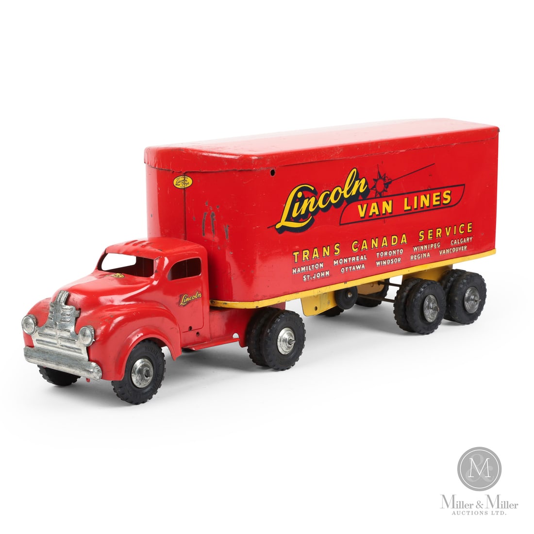 Lincoln Toys "Trans Canada Service" Tractor Trailer: Canadian. 1946-early 1950s. Pressed steel. This toy has a decal that says, "Made in Canada Lincoln Toys Reg'd", which identifies Lincoln toys that were made from 1946 to the early 1950s, representing