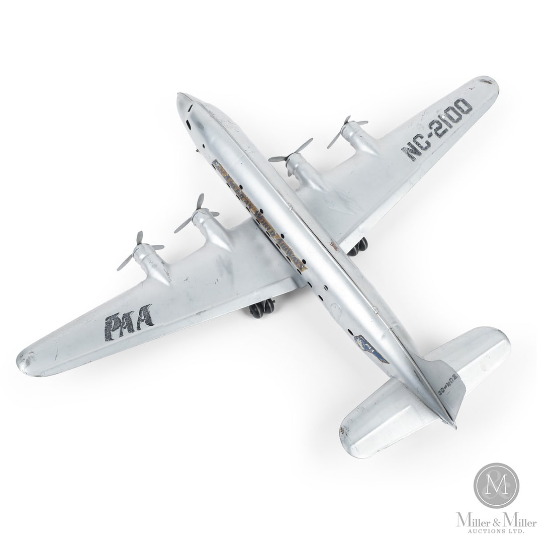 Marx Pan American Airlines NC-2100 Airplane: American. Late 1940s. Pressed steel. Despite the absence of the Louis Marx & Co. logo, this NC-2100 model is known to be manufactured by the Marx company. According to Marx company records, they did n