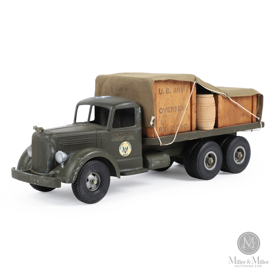 Smith-Miller United States Army Truck: 1949-1952. Pressed steel. This toy has an unusual mark on the chassis, an "H" casting identity mark with some embellishments. When Bob Smith left Smith-Miller, Matt Miller was looking for a new projec