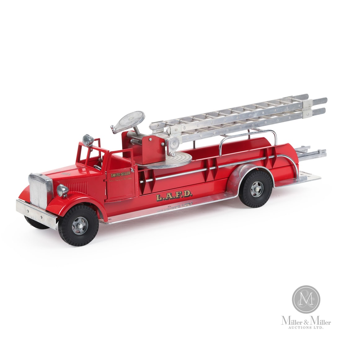 Smith-Miller L.A.F.D. #21 Aerial Fire Truck: American. Early 1950s. Pressed steel. The L.A.P.D. (Los Angeles Fire Department) Number 21 aerial ladder truck, while widely identified as a Smith-Miller toy, the majority of these fire trucks (given